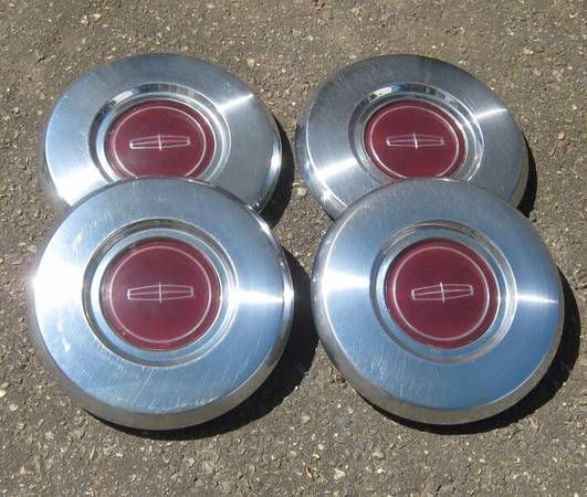 Lincoln  4 hubcaps , center cap , 1