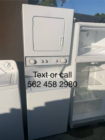 White whirlpool thin twin 24 inch stacked washer and 220 volt dryer combo 1