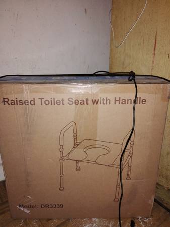 Raised seat with handle 1