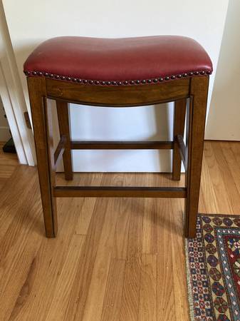 Counter height stool with saddle seat 1