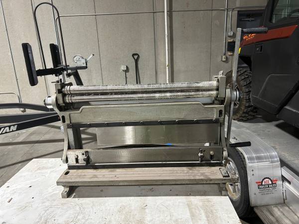 Sheet metal fabrication machine 1