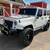 2014 Jeep Wrangler Sahara 1 thumbnail