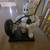 Cast iron Michelin man pumping the tire figure 2 thumbnail