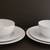 POTTERY BARN AL FRESCO MELAMINE WHITE PLATES, WHITE BOWLS AND BLUE GLA 1 thumbnail