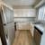 STUDIO WITH FULL VINYL AND STAINLESS STEEL APPLIANCES! 1 thumbnail
