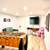 wood burning free stand fireplace - kitchen - finished basement 5 thumbnail