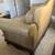 Classic Tan Leather Loveseat with Ornate Wood Details 5 thumbnail