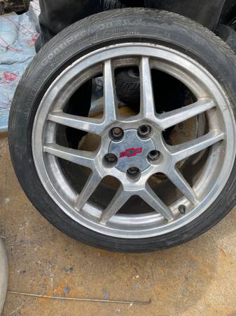 1 CORVETTE WHEEL  AND TIRE 18” 1