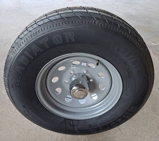 16 Gladiator Trailer Tire 235 80 R16 E on 6 Lug Silver Mod Wheel 1