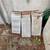 Outdoor glass top table, patio stones, chairs, water heater for scrap. 6 thumbnail