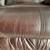 leather love seat- reclines and rocks 3 thumbnail