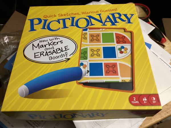 Pictionary game with markers and erasable boards 1