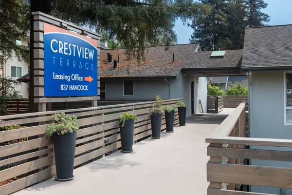 2 Bed 1 bath ground floor unit with a fireplace and pool view 1