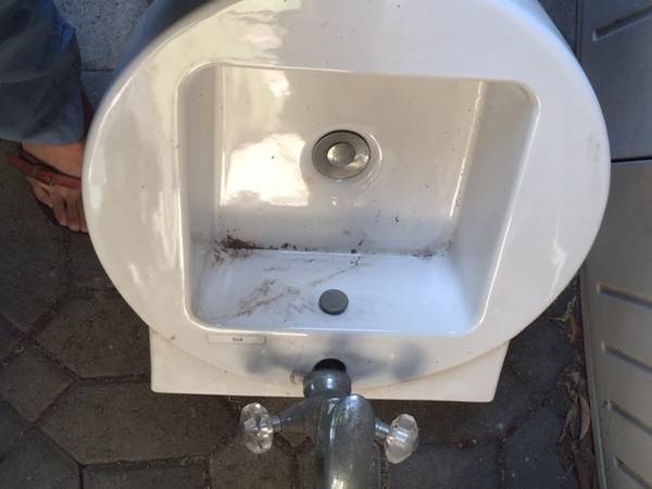 *Sink with faucet, never used, 21x19.5 1
