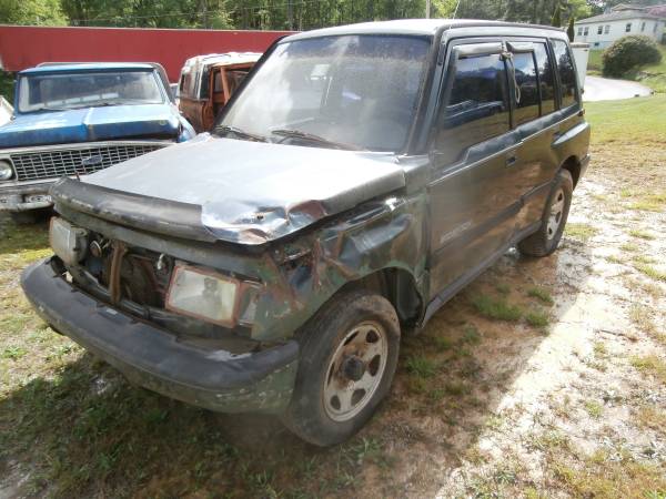 1997 SUZUKI SIDEKICK 4 DR.. 1