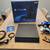 PS4 Pro 1 TB black + 2 controllers and charging stand 1 thumbnail