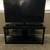 Smoked glass TV stand and TV for sale $150 1 thumbnail