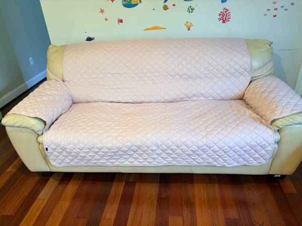 Matching Cream Leather Sofas (2) – 7’ x 3’ x 3’ – Covers Included 1