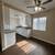 Simple Upstairs Unit above a garage w/ Enclosed Balcony 4 thumbnail