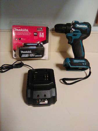 MAKITA drill & battery w charger NEW MUST call/ number is in details t 1