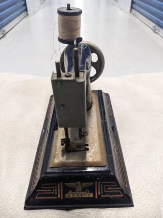 Antique child's sewing machine 1