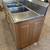 3 bowl sink w/ drainboards, waste drain valves, & wood cabinet 6 thumbnail