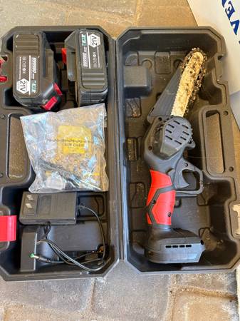 Needs repair-It stops working- used cordless mini chainsaw kit with two 21V lith 1