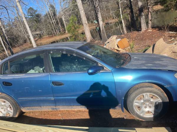 2003 Nissan Altima en efectivo - $1,400 (Ellenwood)63620547795457120