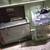 Three fish tanks with all kinds of fake plants and filters 2 thumbnail