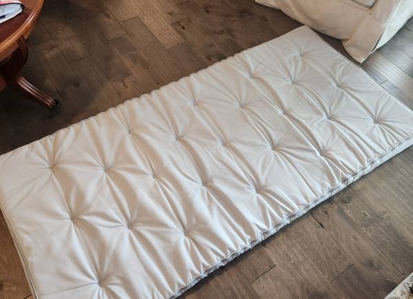 IKEA Sultan Tuffted Mattress Extension Pad.
Perfect for a single bed, 1