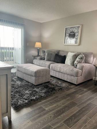 Vaulted Ceiling One Bedroom Residence with Central Air & Swimming Pool 1