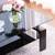 Black Glass Top Cocktail Coffee Table with Wooden Legs Chrome Details 8 thumbnail
