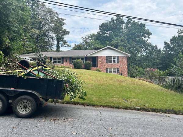 Junk Removal Trailer — You Load, We Haul | Moss & Sons 1