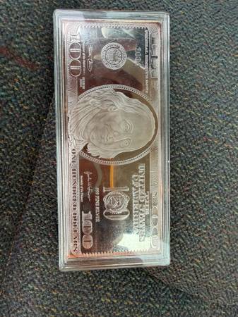 4oz Silver Commerative Dollar 1