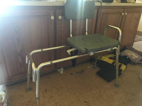 Variety of walkers and shower chairs 1