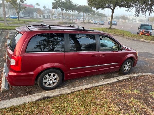 2012 Crysler, Town & Country touring minivan 4D 1