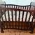 Mini crib-delivered new mattress/converts to todler bed 1 thumbnail