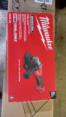 Milwaukee brushless four and a half inch -5 in cut off grinder     d 1