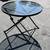 Outdoor Folding Glass and Metal Round Patio Deck Table 35” in Diameter 1 thumbnail