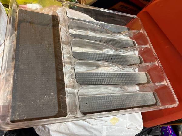 Multi-compartment clear plastic organizer tray. 1