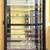 LARGE LOCKABLE  DISPLAY CASE CABINET WITH GLASS SHELVES. 1 thumbnail