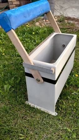 Leaning post with storage or bait tank 1