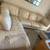 Beige Sectional Couch & ottoman 1 thumbnail