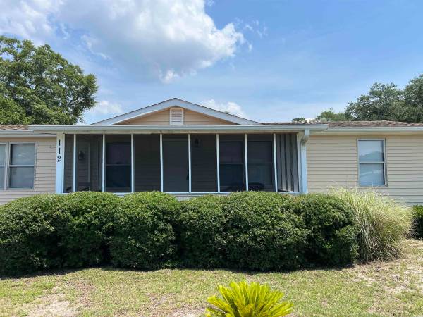 (112) Large Corner Lot with Front Screened Porch 1