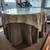 Glass-topped table and accompanying linens 1 thumbnail