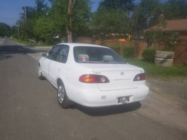 TOYOTA COROLLA 2002 IOW MAIL - $2,800 (Clinton)63616345790337124