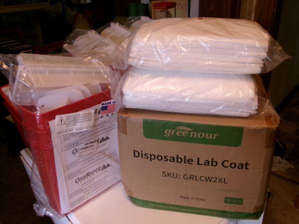 * DISPOSABLE LAB COATS:  5 pack of 10 2XL  AND 2 pack of 10 large. NEW 1