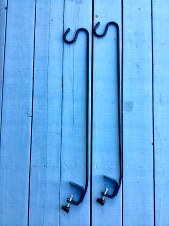 Two black metal bird feeder hangers 1