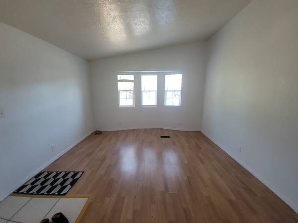 3BR/2BA duplex unit w/ in-unit laundry + private yard 1